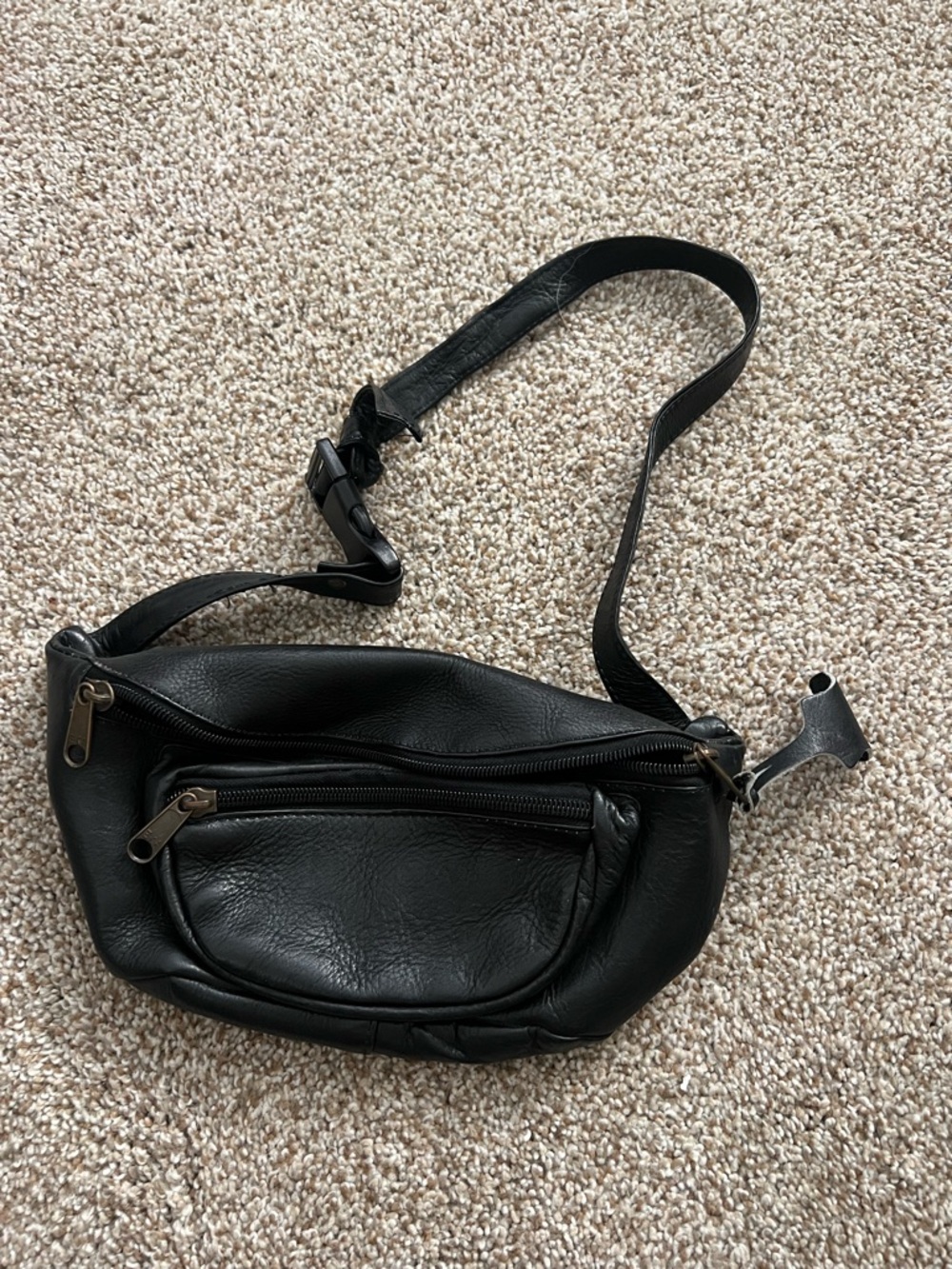 Vintage EKA black leather Fanny pack or sling crossbody bag.